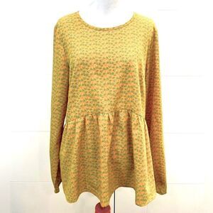 The cutest yellow and blue floral blouse. Flowy.